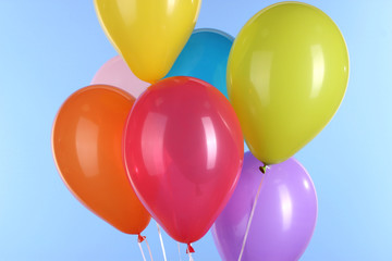 colorful balloons on blue background