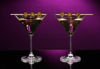 Martini glasses on dark background