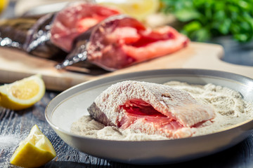 Close-up of fresh carp in batter ready for frying