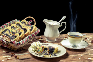 Hot coffee and poppy seed cake served in the traditional way