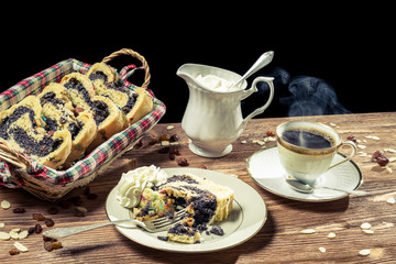 Hot coffee and poppy seed cake with nuts