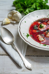 Borscht with dumplings served in a rustic way