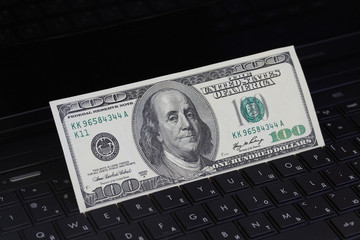 Money on a keyboard