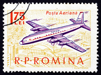 Postage stamp Romania 1963 Plane over City