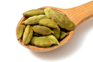cardamom in a wooden spoon