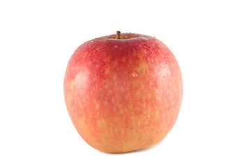 Water droplets bead up on a juicy and colorful, Pink Lady Apple