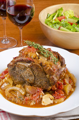 Slow Roasted Pork Served with Red Wine and Green Salad