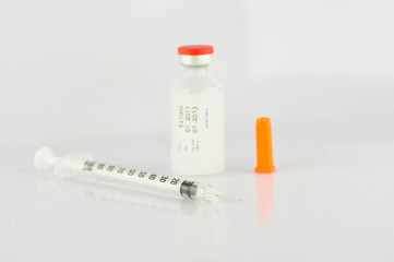 Syringe and insulin vial