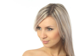 Fototapeta premium Portrait of an attractive blonde girl and positive