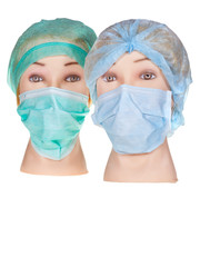 mannequin doctor heads wearing textile surgical cap and mask