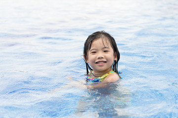 Fototapeta na wymiar kid swimming