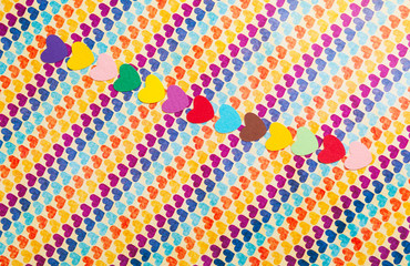 line of multicolored paper hearths
