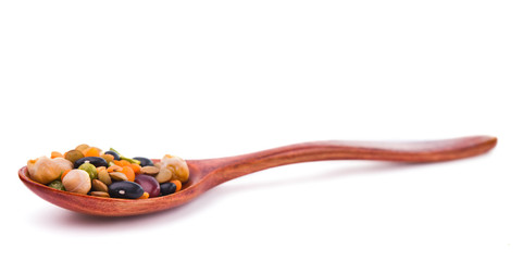collection of beans, legumes, peas, lentils on wooden spoons