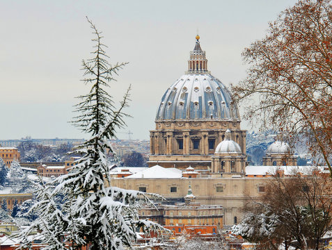 saint peter basilica after snowfall at rome panorama