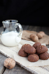 Chocolate cookies with walnuts and milk