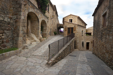 a street in the medieval village of Pals.Spain