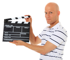 Attraktiver Mann mit Filmklappe