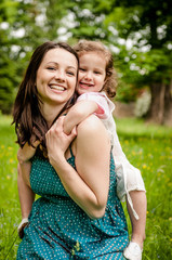 Naklejka premium Happy mother with child