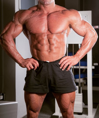 Fototapeta premium bodybuilder posing in the gym