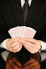 ssman with playing cards, businBusineess risk concept