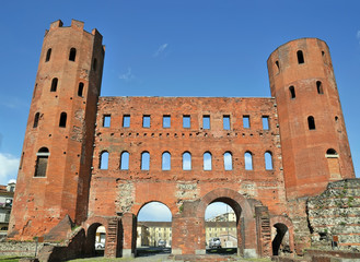 Roman gates Porta Palatina on blue sky - 48111936