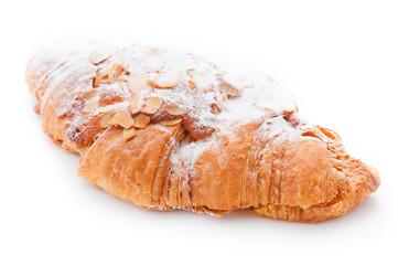 Croissant with almond on a white background