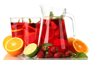 sangria in jar and glasses with fruits, isolated on white