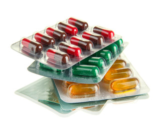 Capsules packed in blisters, isolated on white