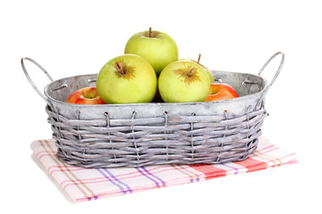 Ripe apples in basket isolated on white