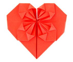 Origami paper heart isolated on white.