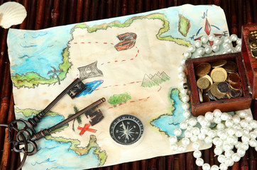 map of treasures on dark wooden background