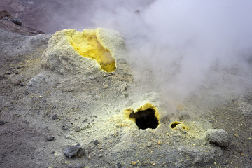 Sulfur fumarole in active volcanic crater