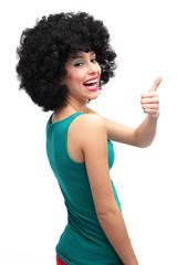 Girl with afro showing thumbs up