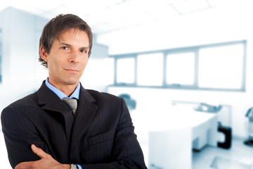 Fototapeta premium Confident businessman in his office