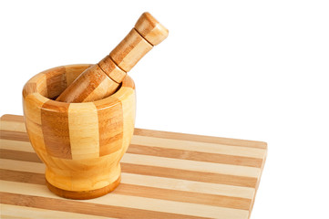 Mortar and pestle on a cutting board