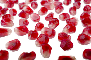 Pomegranate seeds, isolated over white