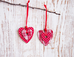 Hearts hanging  on a twig