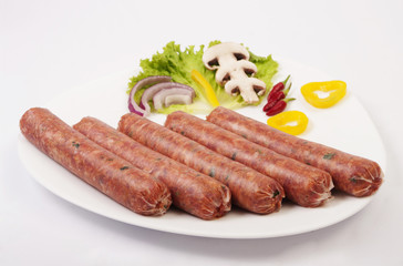 fresh raw sausage on white background