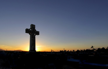 Celtic cross at sunset