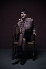 beautiful girl smoking pipe