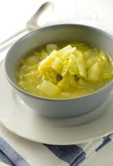 Savoy cabbage soup with potatoes and leek