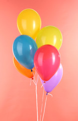 colorful balloons on red background
