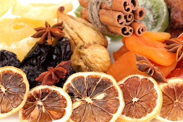 Dried fruits with cinnamon and star anise close-up