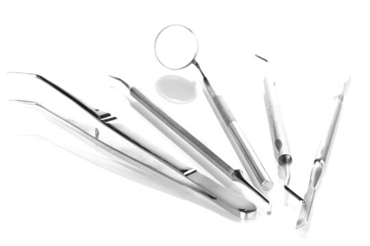 Set of dental tools for teeth care isolated on white