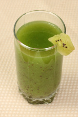 Green juice on light background