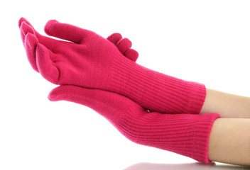 woman knitted gloves on hands, isolated on white