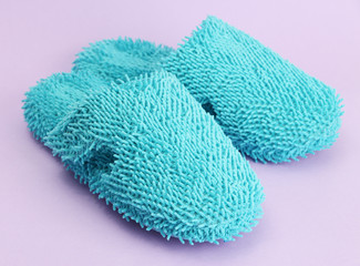 bright slippers, on purple background