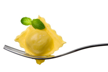 ravioli pasta parcel and basil garnish on fork white background - Powered by Adobe