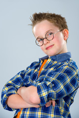 boy with stylish hair and round glasses