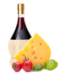Red wine bottle, cheese and tomato still life